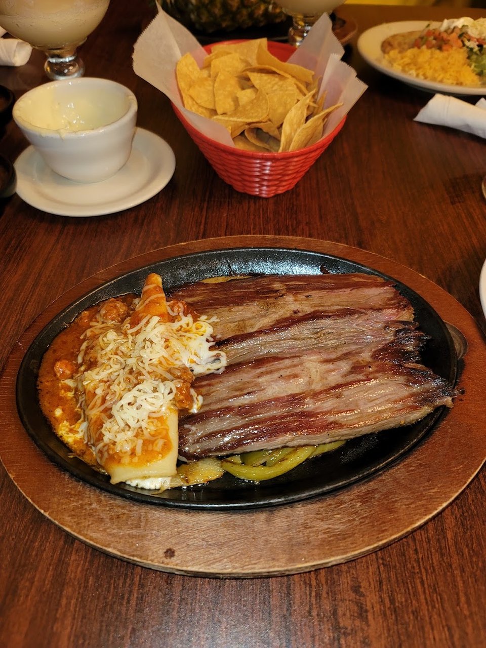 Small plates with salsa and rice.
